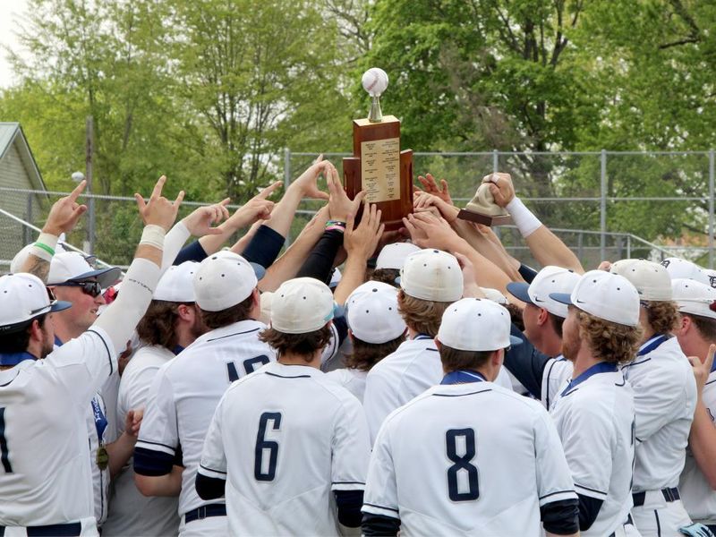 The Penn State DuBois baseball team lifts the PSUAC trophy after securing the conference title for the second year in a row.